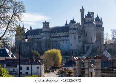 PIERREFONDS, FRANCE - APRIL 7, 2021: The Medieval Castle Of Pierrefonds Is An Imposing Fortress Located At The Edge Of The Forest Of Compiègne, Classified As A Historical Monument Since 1862.