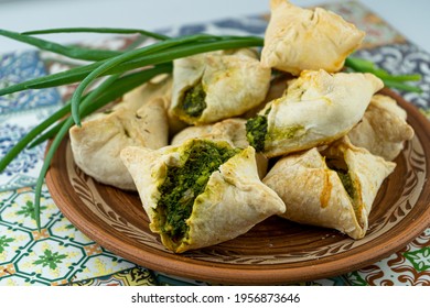 Pies With Wild Garlic And Green Onions. Homemade Food. Puff Pastry. Baking On A Plate, Close-up. Local Food. Ramson