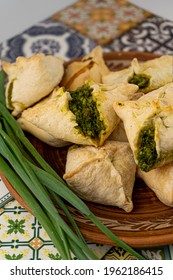 Pies With Wild Garlic And Green Onions. Homemade Food. Puff Pastry. Baking On A Plate, Close-up. Local Food