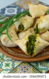 Pies With Wild Garlic And Green Onions. Homemade Food. Puff Pastry. Baking On A Plate, Close-up. Local Food