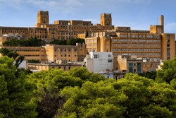 Pieta Town Skyline In Malta, Townscape With Historic St. Luke Hospital On The Right.