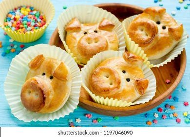 Pig bread buns, funny baking idea shaped cute piggy faces, symbolic food for new year 2019