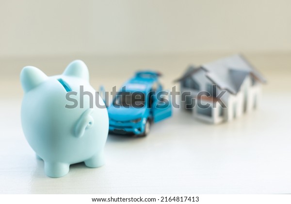 pig piggy bank, toy car,\
house