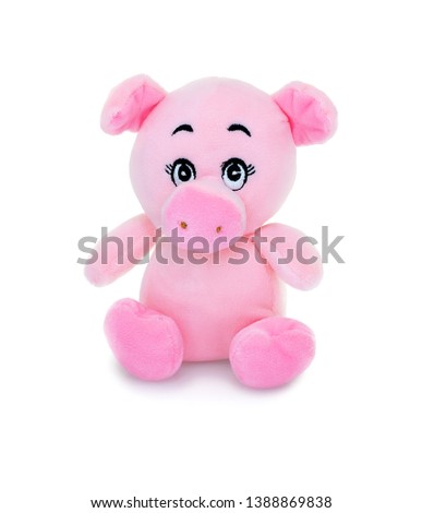 Pig plushie doll isolated on white background with shadow reflection. Hog plush stuffed puppet on white backdrop. Colored stuffed pig toy. Pink pig.