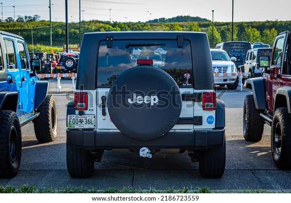 Pigeon Forge, TN - August 25, 2017: Modified Off\
Road Jeep Wrangler JK Sport Unlimited Hardtop at a local enthusiast\
rally.