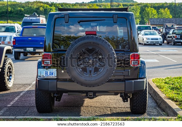 Pigeon Forge, TN - August 25, 2017: Lightly\
Modified Off Road Jeep Wrangler JK Sahara Unlimited at a local\
enthusiast rally.