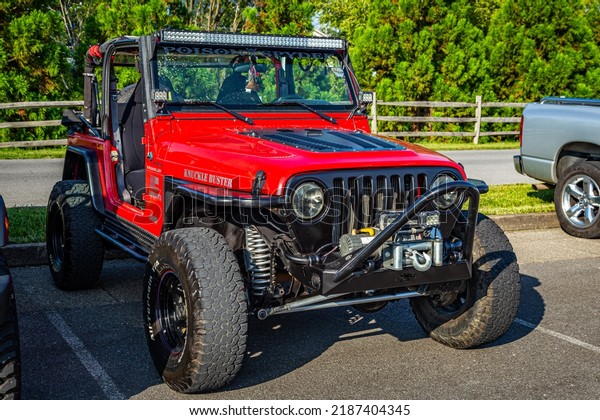 Pigeon Forge, TN -\
August 25, 2017: Modified Off Road Jeep Wrangler TJ Soft Top at a\
local enthusiast rally.