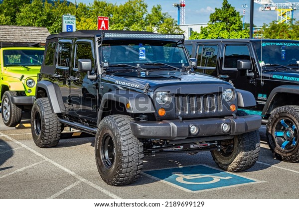 Pigeon\
Forge, TN - August 25, 2017: Modified Off Road Jeep Wrangler Sport\
JK Unlimited Soft Top at a local enthusiast\
rally.