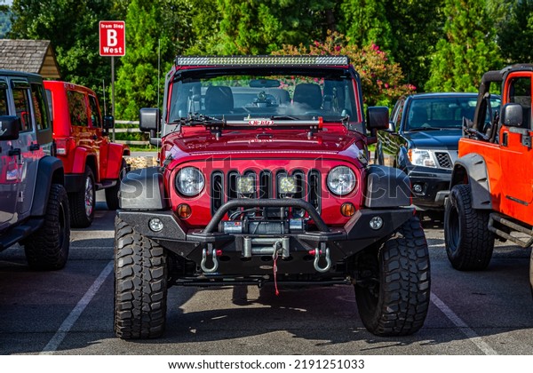 Pigeon Forge, TN -\
August 25, 2017: Modified Jeep Wrangler Sport JK Soft Top at a\
local enthusiast rally.