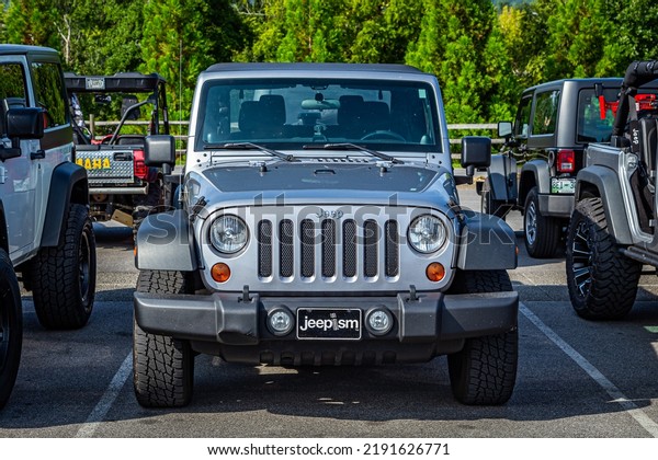 Pigeon Forge, TN -
August 25, 2017: Modified Jeep Wrangler Sport JK Soft Top at a
local enthusiast rally.