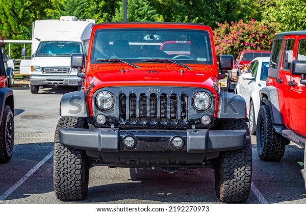 Pigeon\
Forge, TN - August 25, 2017: Modified Jeep Wrangler Sport Willys\
Wheeler JK Soft Top at a local enthusiast\
rally.
