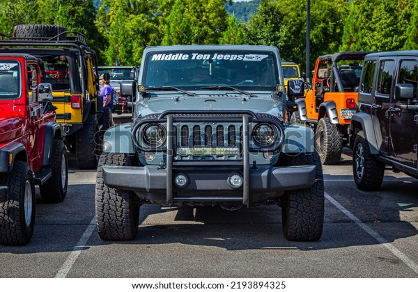 Pigeon\
Forge, TN - August 25, 2017: Modified Jeep Wrangler Sahara\
Unlimited JK Hardtop at a local enthusiast\
rally.