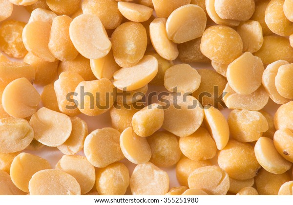 Pigeon pea split\
isolated on white\
background