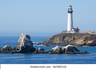 Pigeon Point Light Hose On San Mateo Coast With Rocks In Foreground 