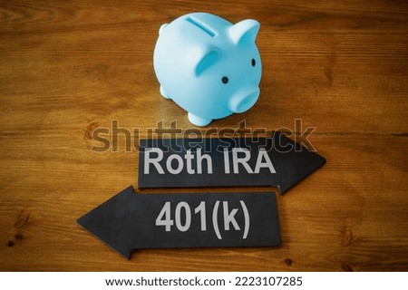 Piggy bank and arrows with signs Roth IRA and 401k retirement plan.