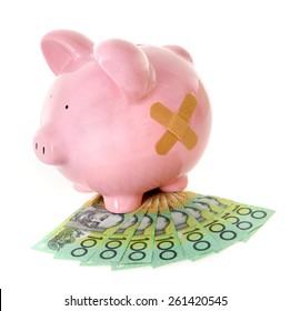 Piggy Bank With Bandaid And Australian Money - Aussie Currency