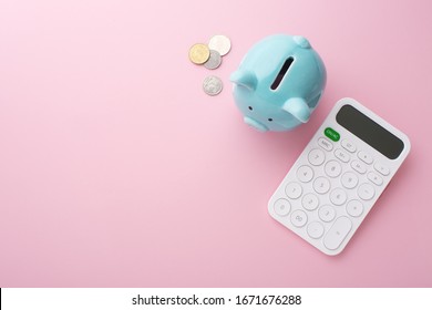 Piggy Bank, Calculator And Coin On Pink Background, Saving Money Concept, Flat Lay