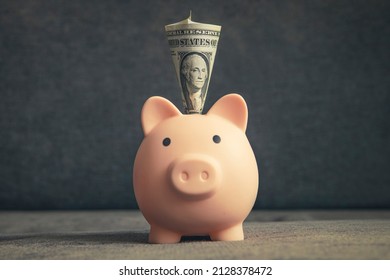 Piggy bank. the concept of preserving and saving money. dollars in the piggy bank.