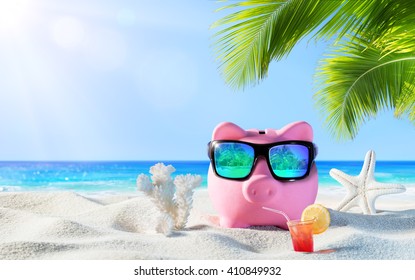 Piggy Bank With Drink On The Palm Beach - Holidays In Economic
 - Powered by Shutterstock