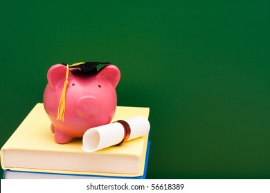 Piggy Bank With A Grad Cap And Diploma On A Stack Of Books, Education Scholarship