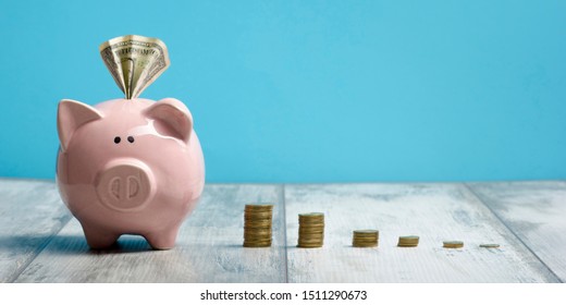Piggy bank isolated on yellow background - Shutterstock ID 1511290673