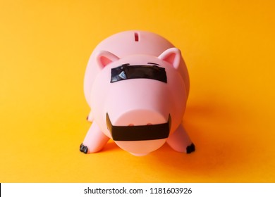 Piggy Bank Mouth And Eyes Covered With Black Duct Tape