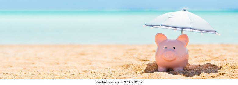 Piggy Bank On Beach With Umbrella. 401k Retire Money - Powered by Shutterstock