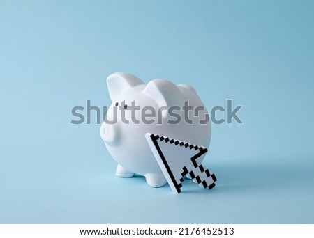 Piggy piggy bank on pastel blue background and pixel mouse cursor. Minimal trend creative concept of income and savings online or remote work from home.