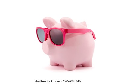 Piggy bank with pink glasses on white background  - Powered by Shutterstock