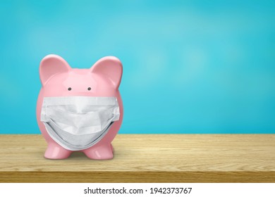 Piggy Bank Wearing A Surgical Face Mask During Coronavirus Pandemic.