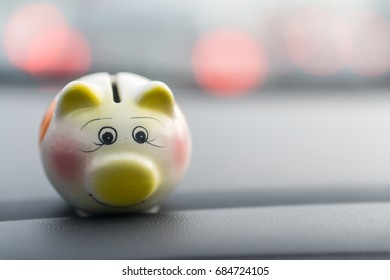 Piggy Money Bank Box In The Car On The Street., Traffic Jam.