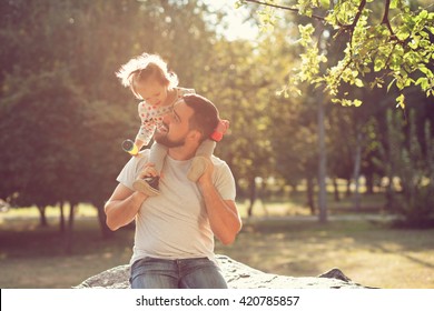 Piggyback of baby and dad