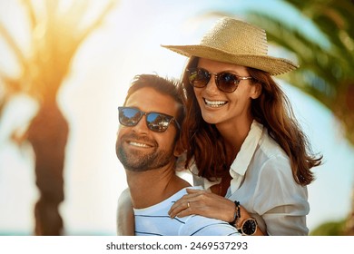 Piggyback, portrait and smile with couple on beach together for anniversary, love or romance in summer. Date, travel or vacation with happy man and woman on tropical island paradise for honeymoon - Powered by Shutterstock