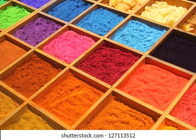 Pigment powder for sale at a market stall for artists