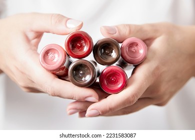 Pigments in bottles for tattoos and permanent makeup in woman hands closeup. Tattoo ink - Shutterstock ID 2231583087