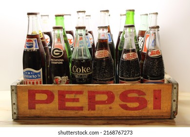 Pikeville, KY United States - June 18th, 2022: Antique Soda Bottles Still Full In A Wooden Pepsi Crate. 