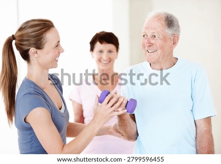 Pilates, personal trainer and old man in class with dumbbells, support or fitness in retirement. Senior resident, happy instructor and weights at facility for guide, muscle wellness or exercise group