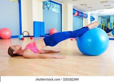 Pilates Woman Pelvic Lift Fitball Exercise Workout At Gym Indoor Swiss Ball