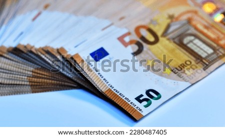 Pile of 50 euro notes business background