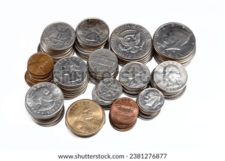 Pile of American coins of different times and values, 1 cents, dimes, quarters, half dollars, and dollars, vintage retro old United States of America coins, exchange rate, economy concept, USA coins