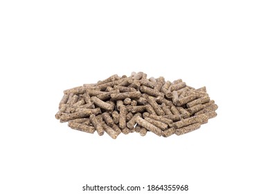 A Pile Of Animal Feed Pellets Isolated On A White Background. The Concept Of A Composition Of Pellets For Feeding Farm Animals And Fish.