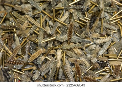 Pile Of Assault Rifle Bore Cleaning Brushes.