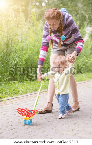 Similar – Image, Stock Photo Little girl and woman carrying basket with apples