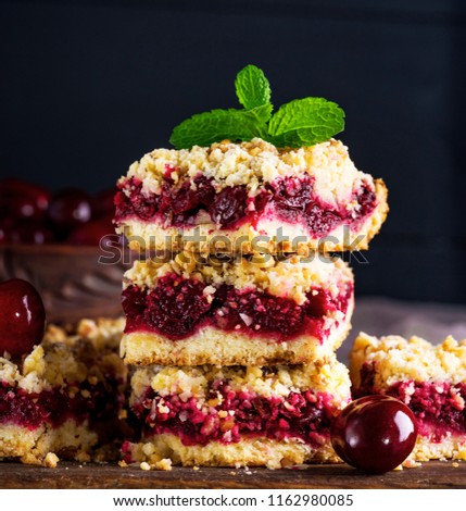 Similar – Image, Stock Photo pile of baked cake with cherry