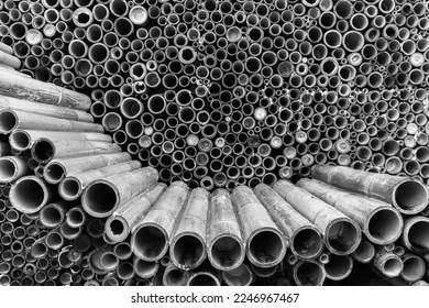 Pile of bamboo pole used in construction industry, bamboo wall textured background - Powered by Shutterstock