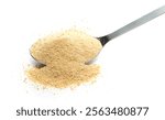 Pile biscuit crumbs in metal spoon, isolated on white, side view