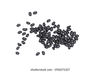 Pile of black beans ( Urad dal, black gram, vigna mungo ) isolated on white background .