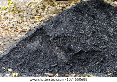 a pile of black coal