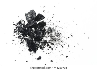Pile of black coal bars isolated on white background - Shutterstock ID 744259798