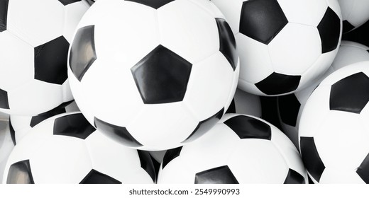 Pile of black and white soccer balls. Soccer balls stacked together. Classic black and white design. Soccer balls for sports and games. Football background. Sport background. - Powered by Shutterstock